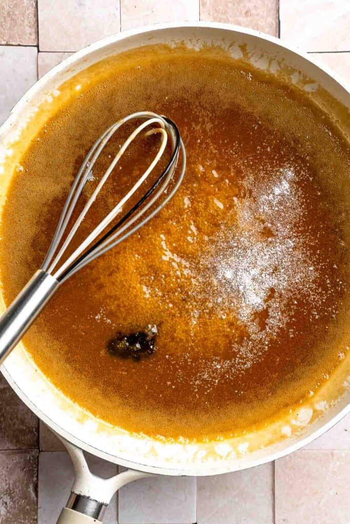 Indulge in a classic British dessert with this sticky toffee pudding recipe made with dates and topped with rich toffee sauce. Moist, sweet, and decadent! | aheadofthyme.com