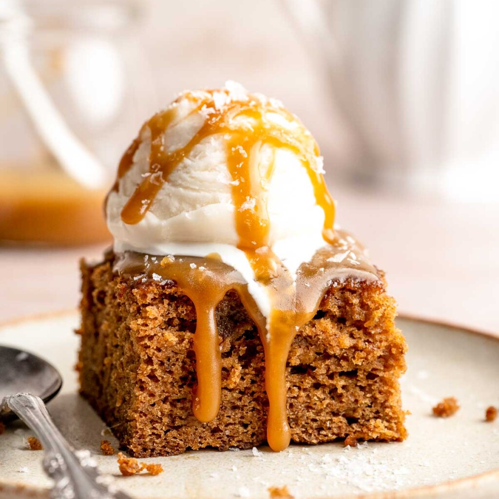 Indulge in a classic British dessert with this sticky toffee pudding recipe made with dates and topped with rich toffee sauce. Moist, sweet, and decadent! | aheadofthyme.com