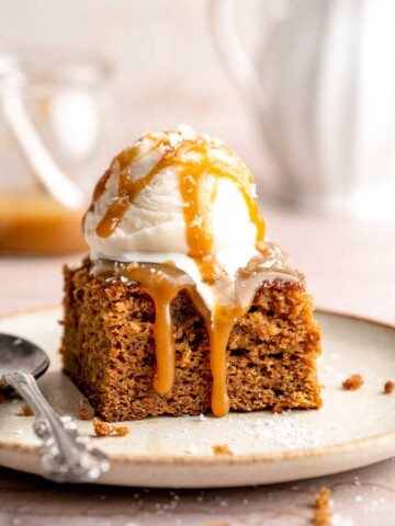 Indulge in a classic British dessert with this sticky toffee pudding recipe made with dates and topped with rich toffee sauce. Moist, sweet, and decadent! | aheadofthyme.com