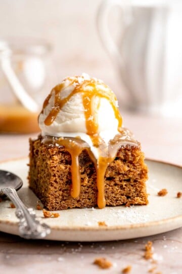 Indulge in a classic British dessert with this sticky toffee pudding recipe made with dates and topped with rich toffee sauce. Moist, sweet, and decadent! | aheadofthyme.com