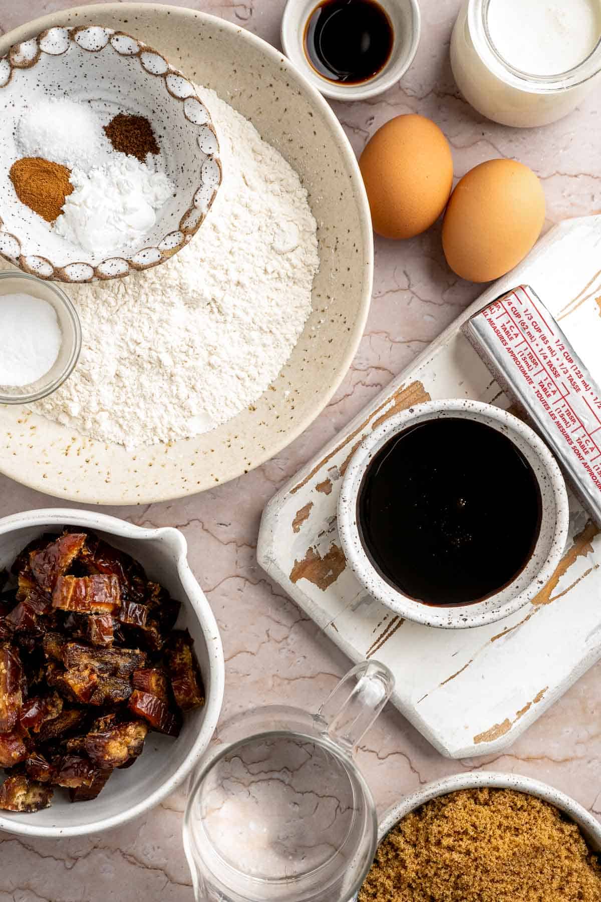 Indulge in a classic British dessert with this sticky toffee pudding recipe made with dates and topped with rich toffee sauce. Moist, sweet, and decadent! | aheadofthyme.com