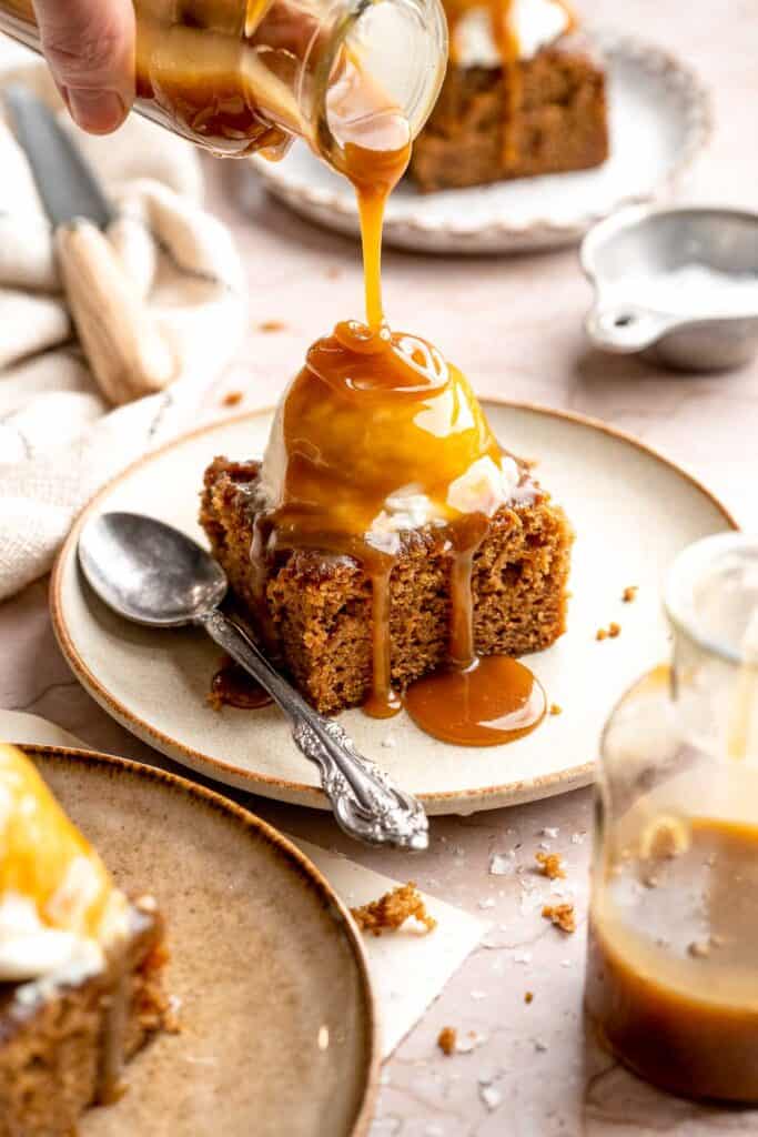 Indulge in a classic British dessert with this sticky toffee pudding recipe made with dates and topped with rich toffee sauce. Moist, sweet, and decadent! | aheadofthyme.com