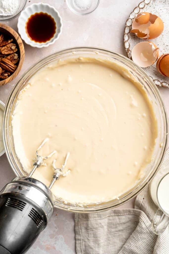 Rich and creamy Turtle Cheesecake with caramel, chocolate, and pecans is a decadent baked dessert with a buttery graham crust and silky filling. | aheadofthyme.com