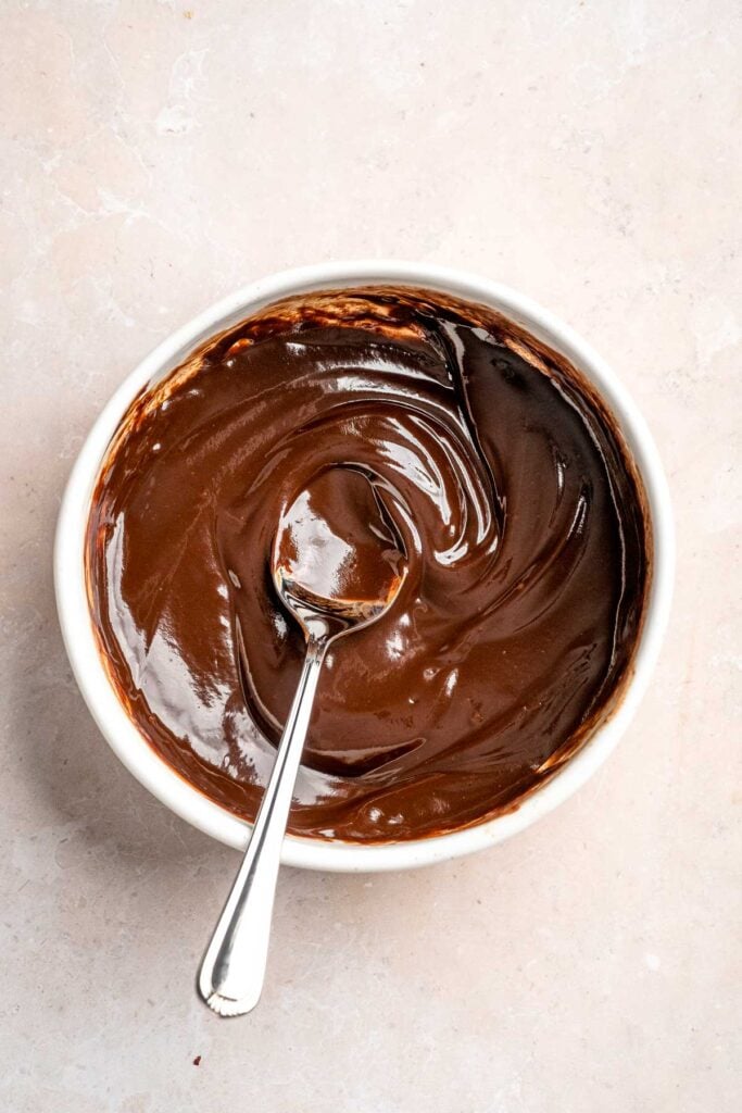 Rich and creamy Turtle Cheesecake with caramel, chocolate, and pecans is a decadent baked dessert with a buttery graham crust and silky filling. | aheadofthyme.com