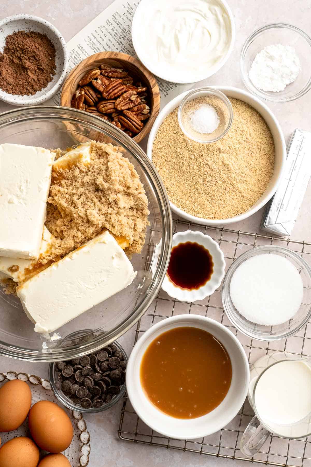 Rich and creamy Turtle Cheesecake with caramel, chocolate, and pecans is a decadent baked dessert with a buttery graham crust and silky filling. | aheadofthyme.com