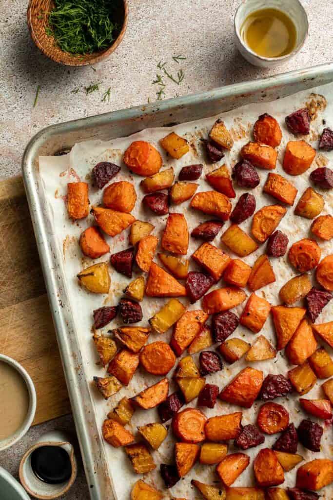 Balsamic Roasted Beets and Carrots are caramelized, sweet, and savory with a glossy glaze. A colorful, healthy side dish with easy air fryer option. | aheadofthyme.com