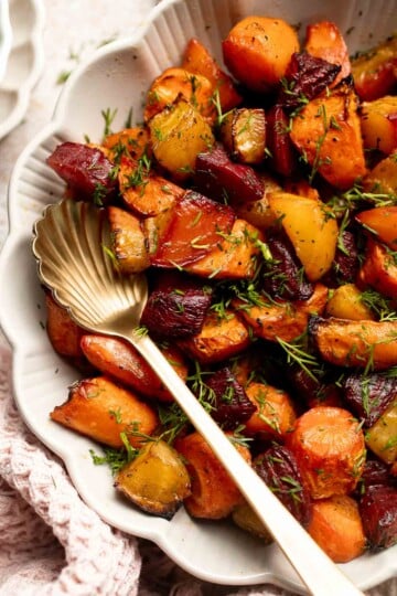 Balsamic Roasted Beets and Carrots are caramelized, sweet, and savory with a glossy glaze. A colorful, healthy side dish with easy air fryer option. | aheadofthyme.com
