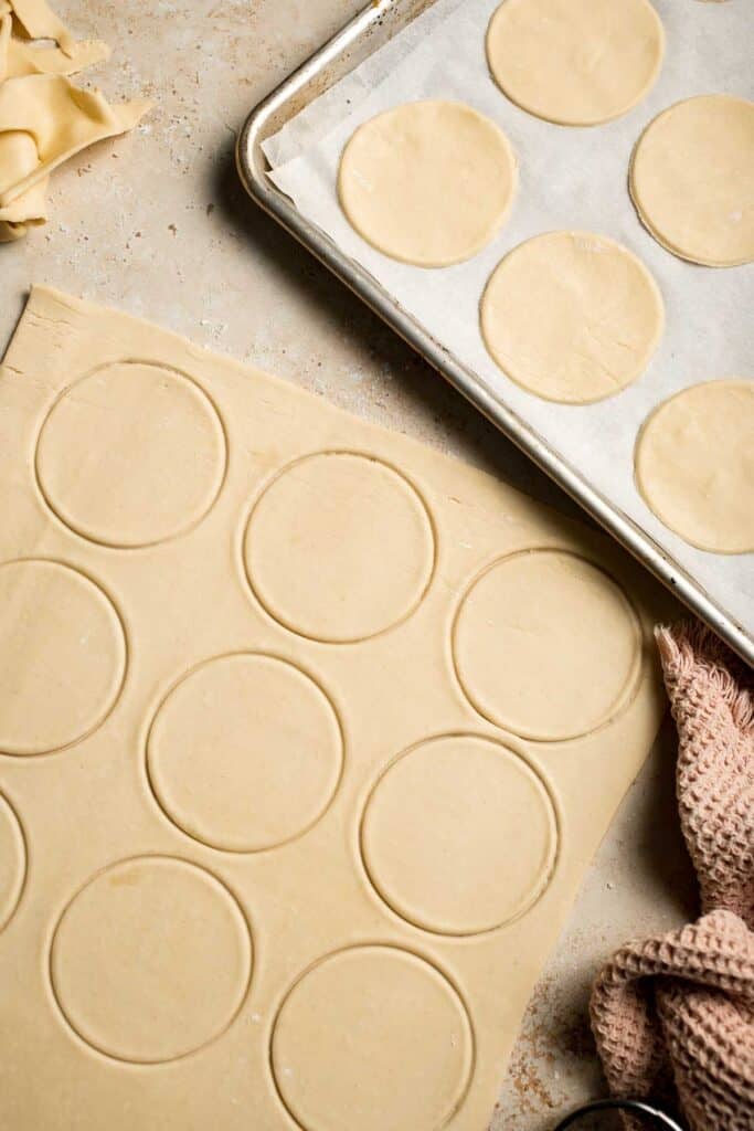 Cranberry Hand Pies are buttery, flaky, and filled with leftover cranberry sauce. An easy, festive holiday dessert perfect for Thanksgiving or Christmas. | aheadofthyme.com