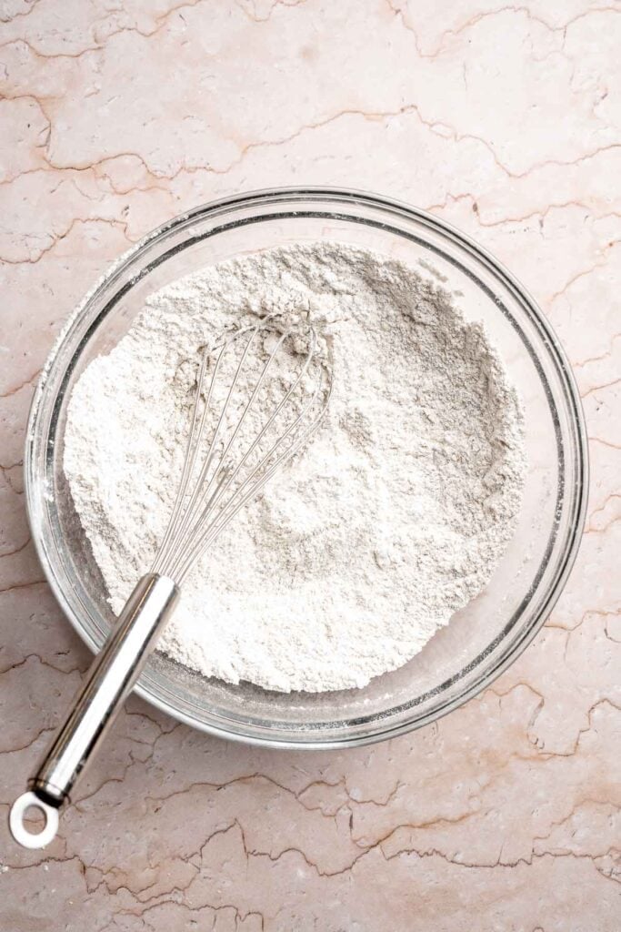 Soft and chewy gingerdoodle cookies, also known as ginger snickerdoodles, rolled in cinnamon ginger sugar with warm spices and molasses. | aheadofthyme.com