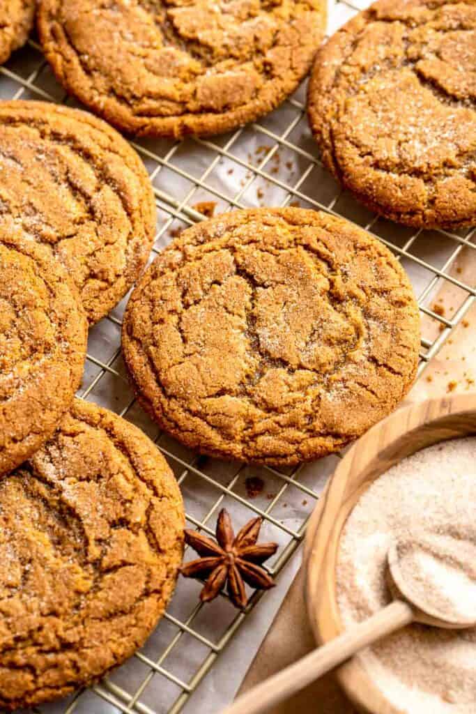 Soft and chewy gingerdoodle cookies, also known as ginger snickerdoodles, rolled in cinnamon ginger sugar with warm spices and molasses. | aheadofthyme.com