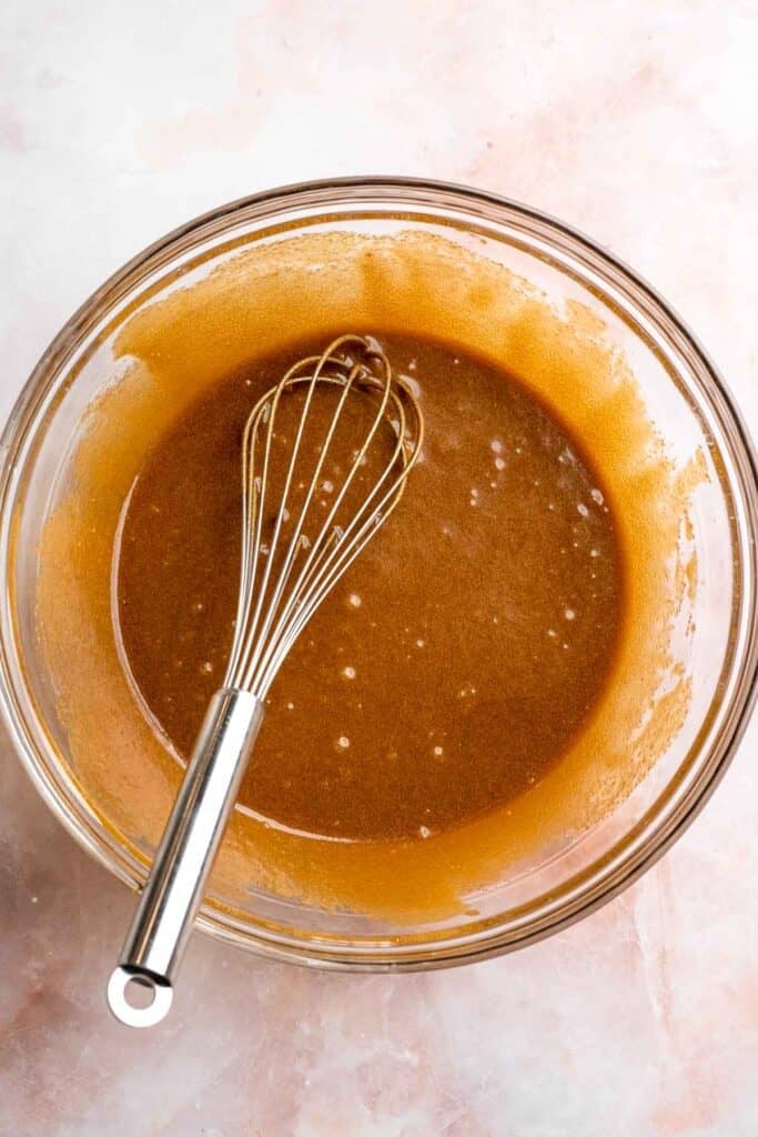 Soft and chewy gingerdoodle cookies, also known as ginger snickerdoodles, rolled in cinnamon ginger sugar with warm spices and molasses. | aheadofthyme.com