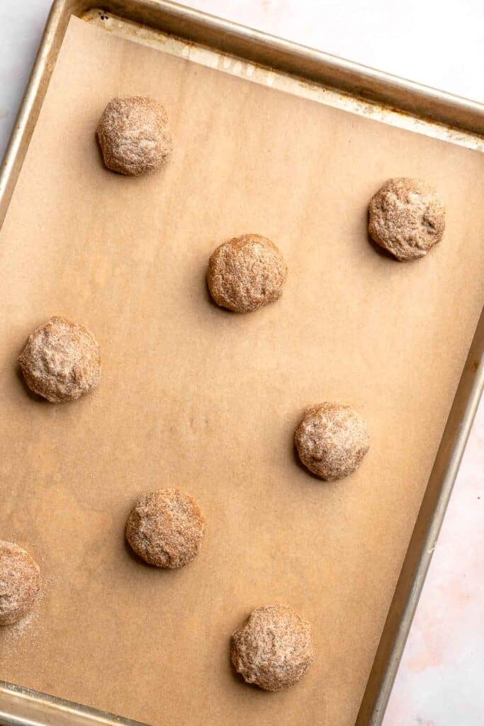 Soft and chewy gingerdoodle cookies, also known as ginger snickerdoodles, rolled in cinnamon ginger sugar with warm spices and molasses. | aheadofthyme.com