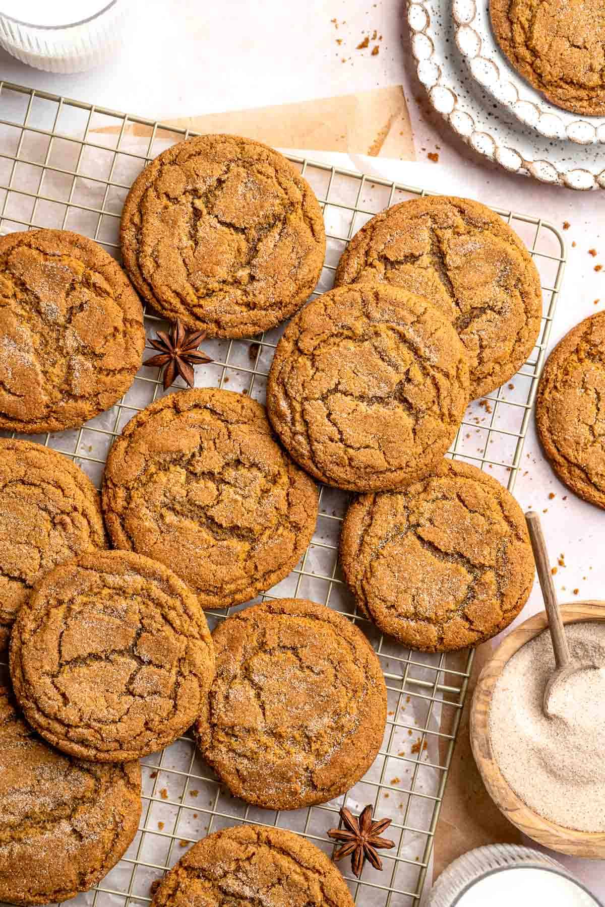 Soft and chewy gingerdoodle cookies, also known as ginger snickerdoodles, rolled in cinnamon ginger sugar with warm spices and molasses. | aheadofthyme.com