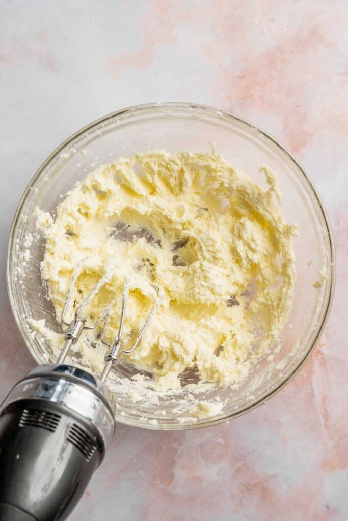 Grinch Cookies are soft, chewy green sugar cookies rolled in sparkly sugar and topped with a red heart. The cutest Christmas cookies for holiday baking. | aheadofthyme.com