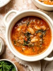 Hearty quinoa vegetable soup with tomatoes, beans, and kale. Healthy, cozy, and easy to make in one pot for a nourishing meal. | aheadofthyme.com