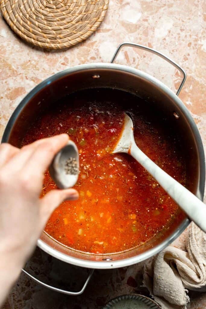 Hearty quinoa vegetable soup with tomatoes, beans, and kale. Healthy, cozy, and easy to make in one pot for a nourishing meal. | aheadofthyme.com
