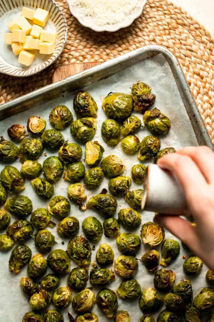Roasted Brussels Sprouts Pasta is creamy, cozy, and full of caramelized sprouts tossed in a garlic Parmesan sauce. A delicious and easy weeknight dinner. | aheadofthyme.com