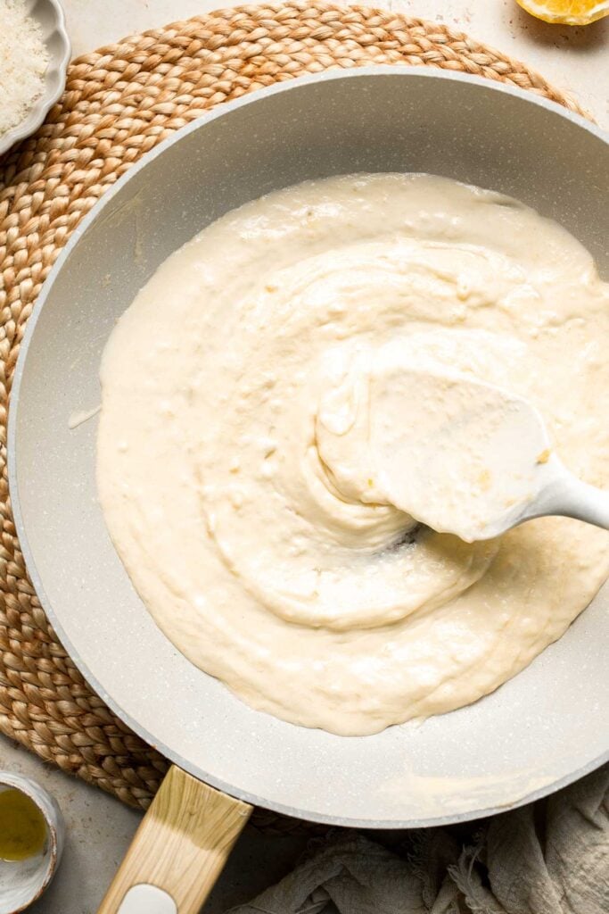 Roasted Brussels Sprouts Pasta is creamy, cozy, and full of caramelized sprouts tossed in a garlic Parmesan sauce. A delicious and easy weeknight dinner. | aheadofthyme.com