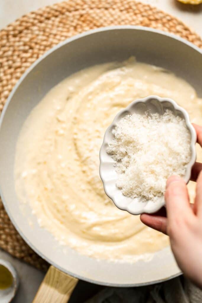 Roasted Brussels Sprouts Pasta is creamy, cozy, and full of caramelized sprouts tossed in a garlic Parmesan sauce. A delicious and easy weeknight dinner. | aheadofthyme.com