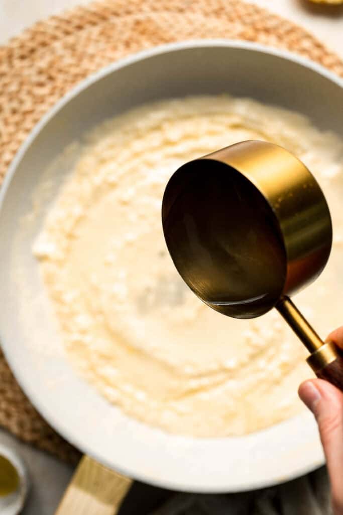 Roasted Brussels Sprouts Pasta is creamy, cozy, and full of caramelized sprouts tossed in a garlic Parmesan sauce. A delicious and easy weeknight dinner. | aheadofthyme.com