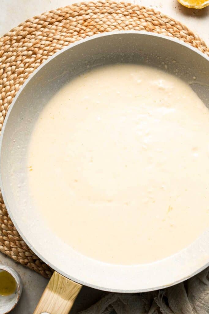 Roasted Brussels Sprouts Pasta is creamy, cozy, and full of caramelized sprouts tossed in a garlic Parmesan sauce. A delicious and easy weeknight dinner. | aheadofthyme.com