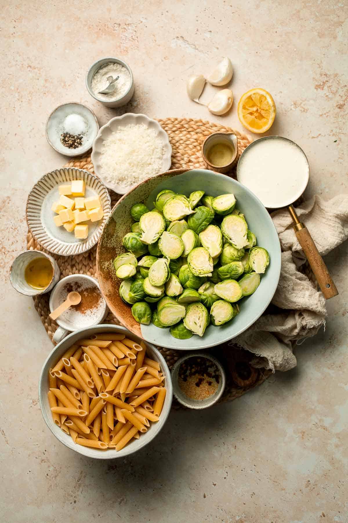 Roasted Brussels Sprouts Pasta is creamy, cozy, and full of caramelized sprouts tossed in a garlic Parmesan sauce. A delicious and easy weeknight dinner. | aheadofthyme.com