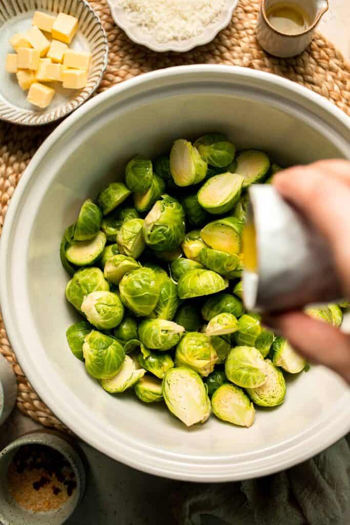 Roasted Brussels Sprouts Pasta is creamy, cozy, and full of caramelized sprouts tossed in a garlic Parmesan sauce. A delicious and easy weeknight dinner. | aheadofthyme.com