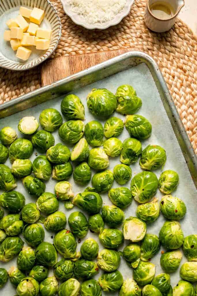 Roasted Brussels Sprouts Pasta is creamy, cozy, and full of caramelized sprouts tossed in a garlic Parmesan sauce. A delicious and easy weeknight dinner. | aheadofthyme.com