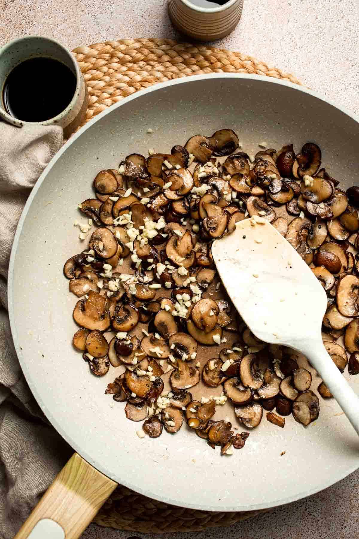 Sautéed Green Beans and Mushrooms are garlicky, buttery, and ready in 25 minutes — a flavorful side dish for any meal. | aheadofthyme.com
