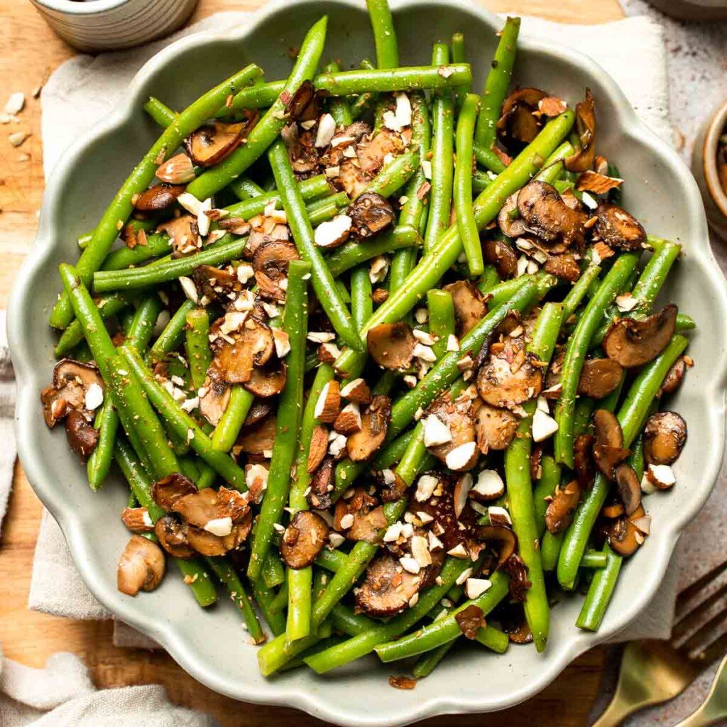 Sautéed Green Beans and Mushrooms are garlicky, buttery, and ready in 25 minutes — a flavorful side dish for any meal. | aheadofthyme.com