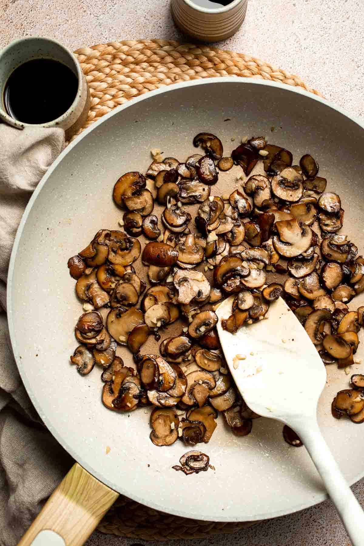 Sautéed Green Beans and Mushrooms are garlicky, buttery, and ready in 25 minutes — a flavorful side dish for any meal. | aheadofthyme.com