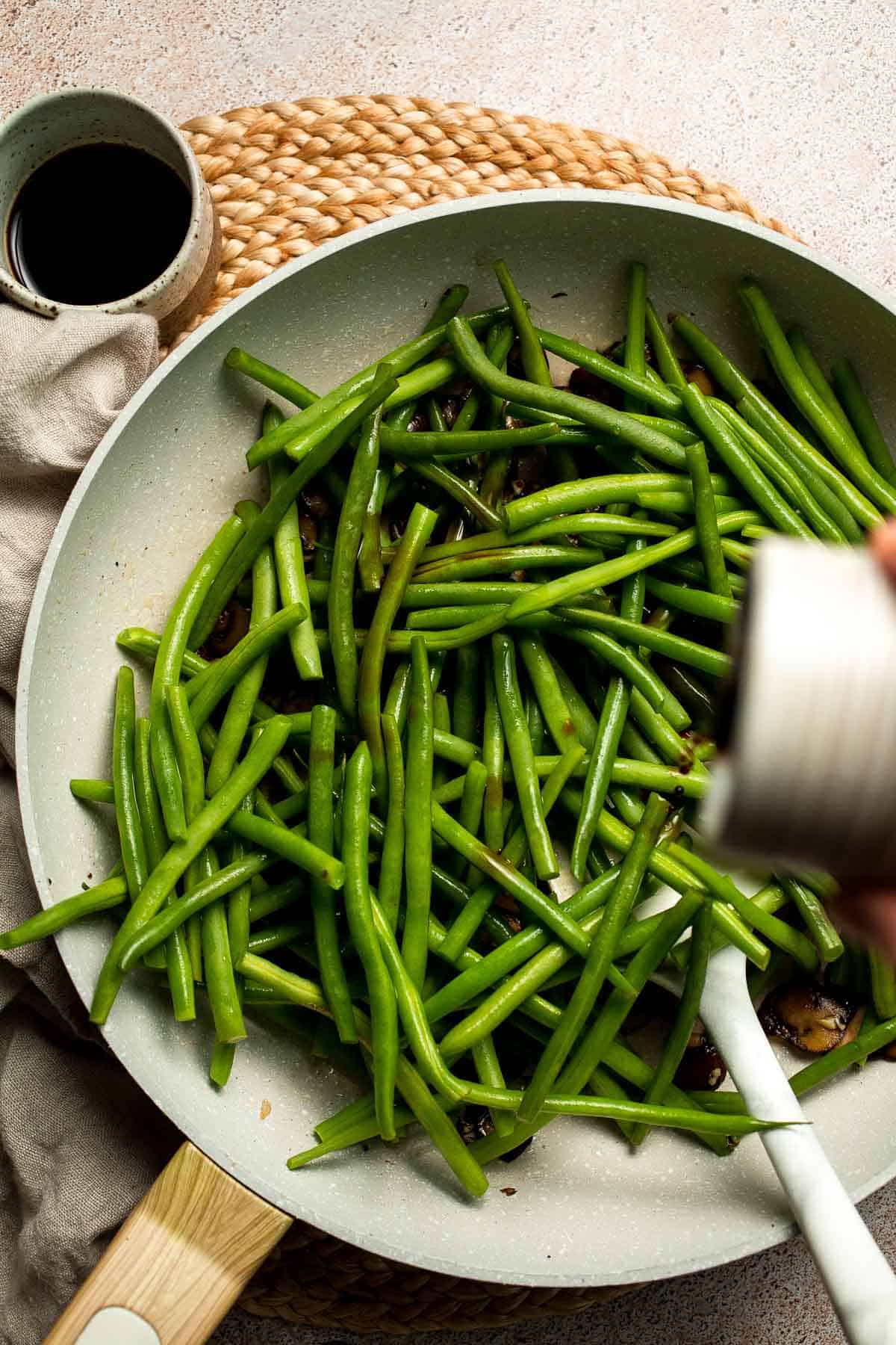 Sautéed Green Beans and Mushrooms are garlicky, buttery, and ready in 25 minutes — a flavorful side dish for any meal. | aheadofthyme.com