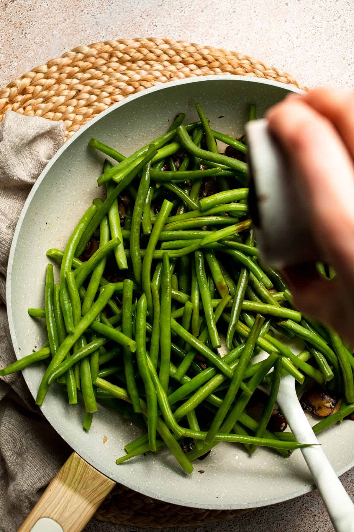 Sautéed Green Beans and Mushrooms are garlicky, buttery, and ready in 25 minutes — a flavorful side dish for any meal. | aheadofthyme.com