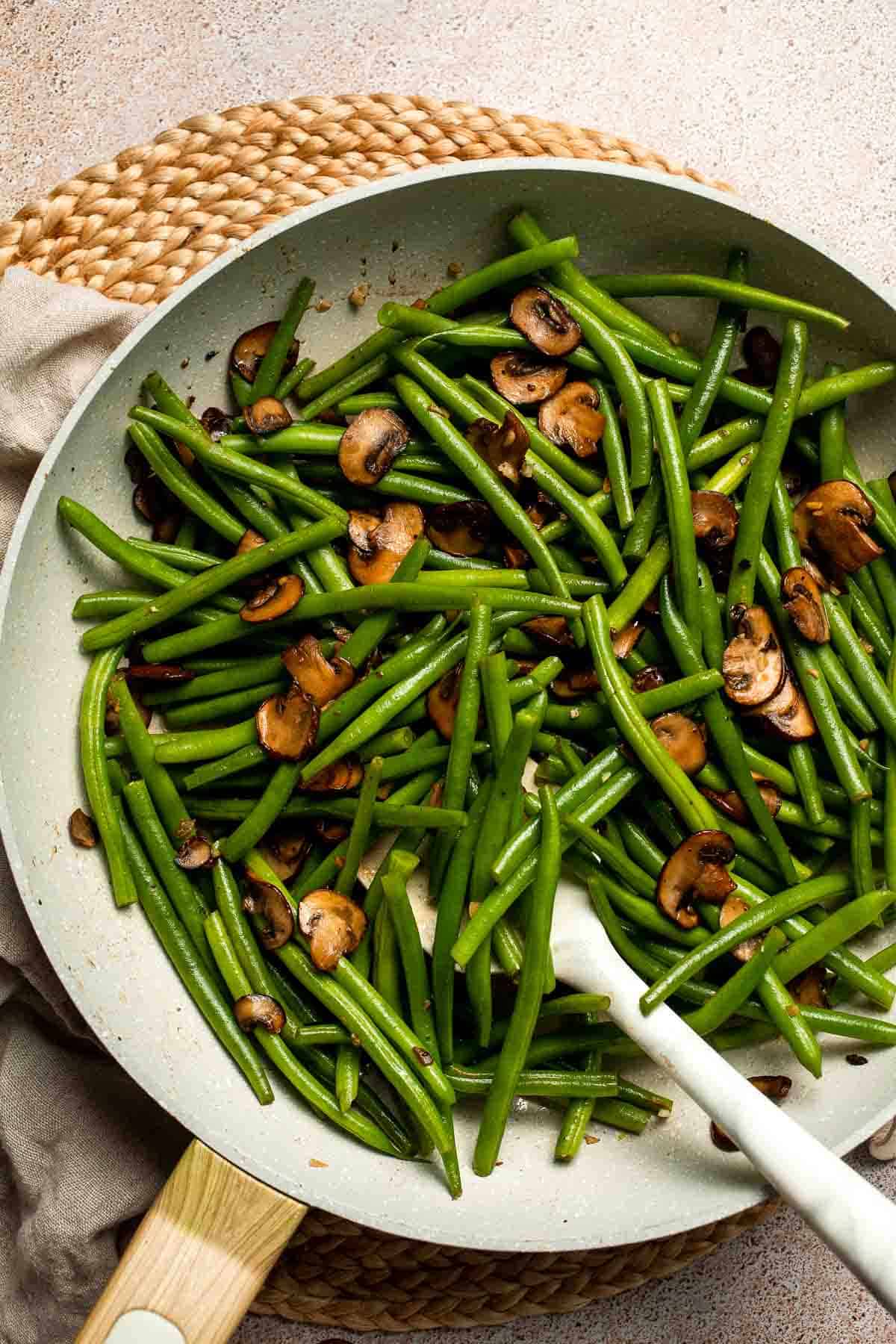 Sautéed Green Beans and Mushrooms are garlicky, buttery, and ready in 25 minutes — a flavorful side dish for any meal. | aheadofthyme.com