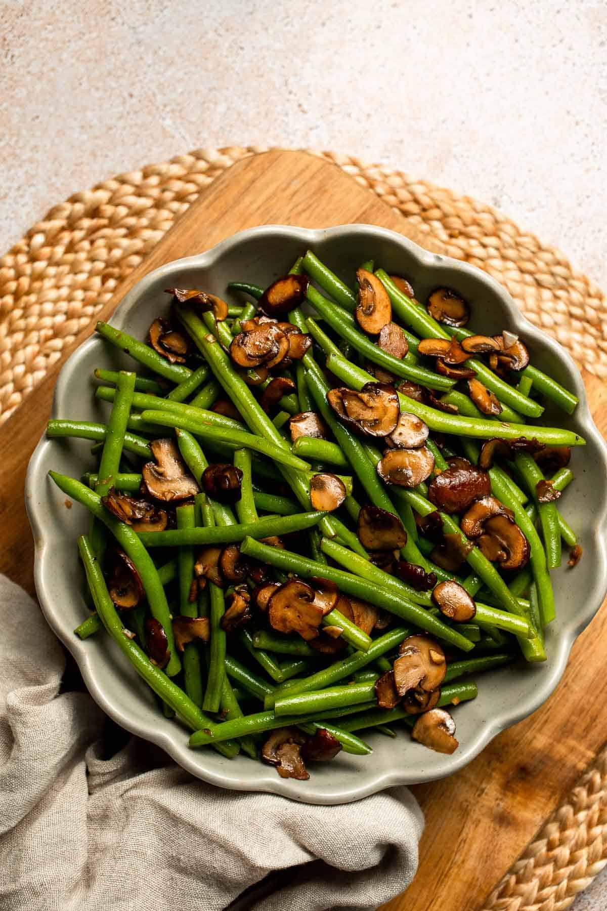 Sautéed Green Beans and Mushrooms are garlicky, buttery, and ready in 25 minutes — a flavorful side dish for any meal. | aheadofthyme.com