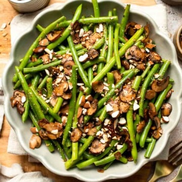 Sautéed Green Beans and Mushrooms are garlicky, buttery, and ready in 25 minutes — a flavorful side dish for any meal. | aheadofthyme.com