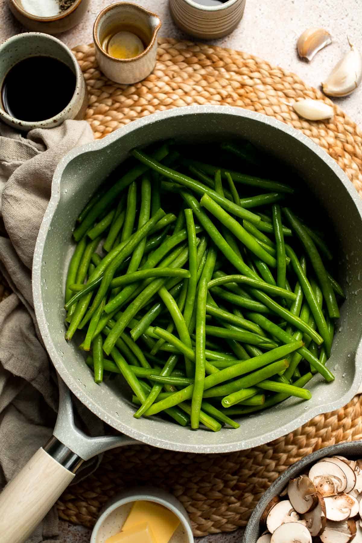 Sautéed Green Beans and Mushrooms are garlicky, buttery, and ready in 25 minutes — a flavorful side dish for any meal. | aheadofthyme.com