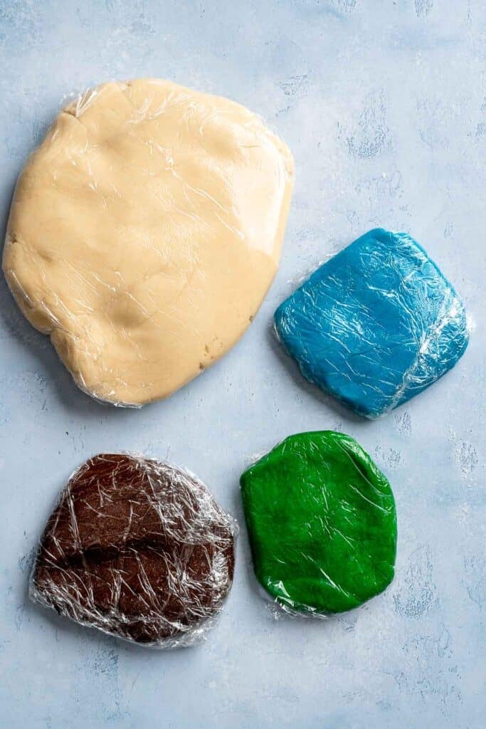 Easy slice and bake Christmas cookies with buttery dough and festive colors, perfect for make ahead holiday baking. | aheadofthyme.com