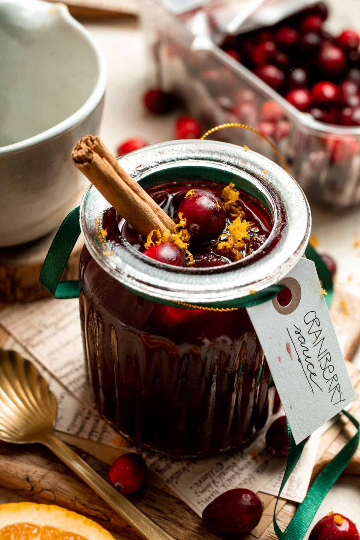 This slow cooker cranberry sauce is sweet, tart, and perfectly spiced. Make this easy cranberry sauce in the crockpot for a stress-free holiday side. | aheadofthyme.com