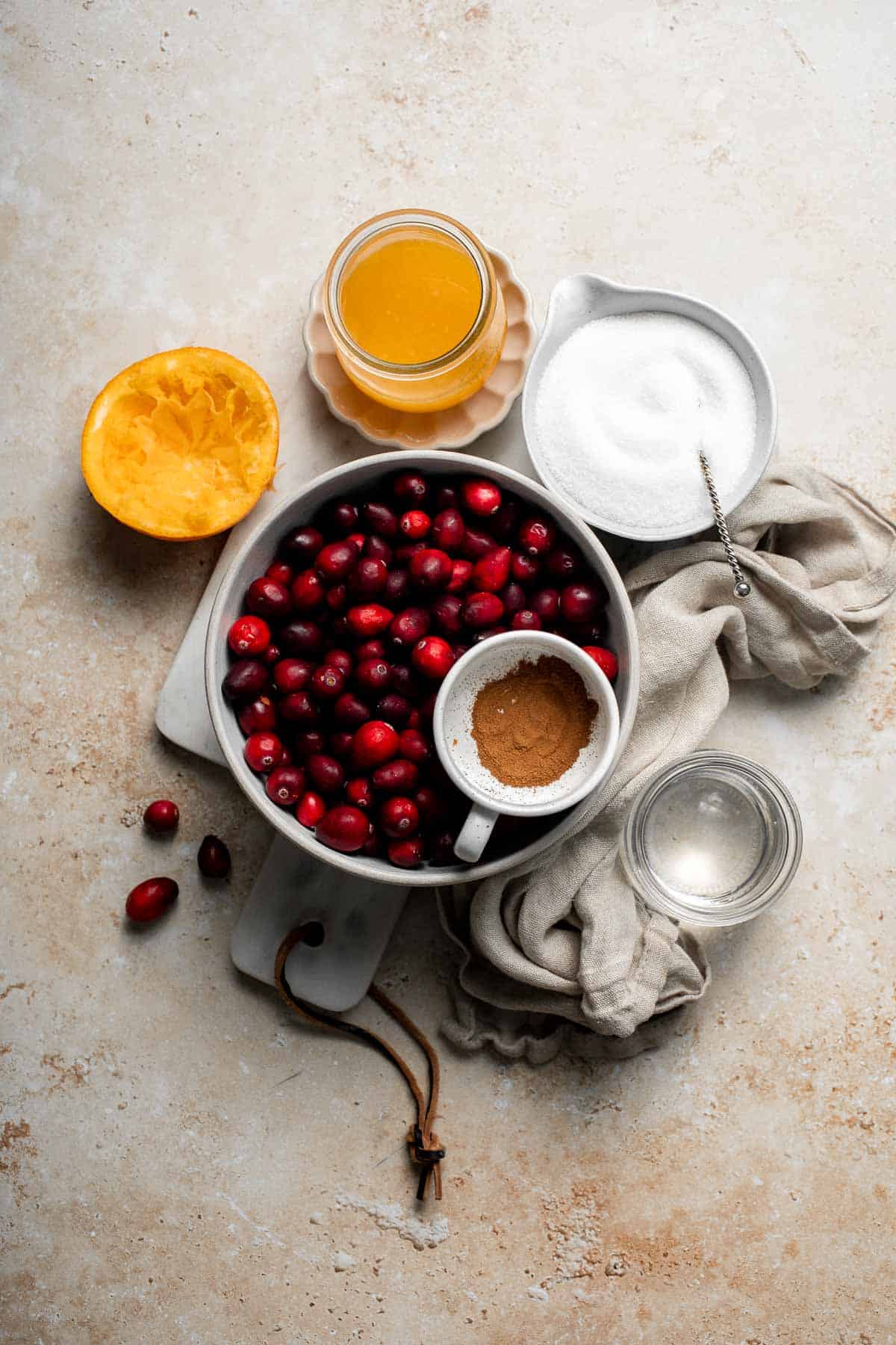 This slow cooker cranberry sauce is sweet, tart, and perfectly spiced. Make this easy cranberry sauce in the crockpot for a stress-free holiday side. | aheadofthyme.com