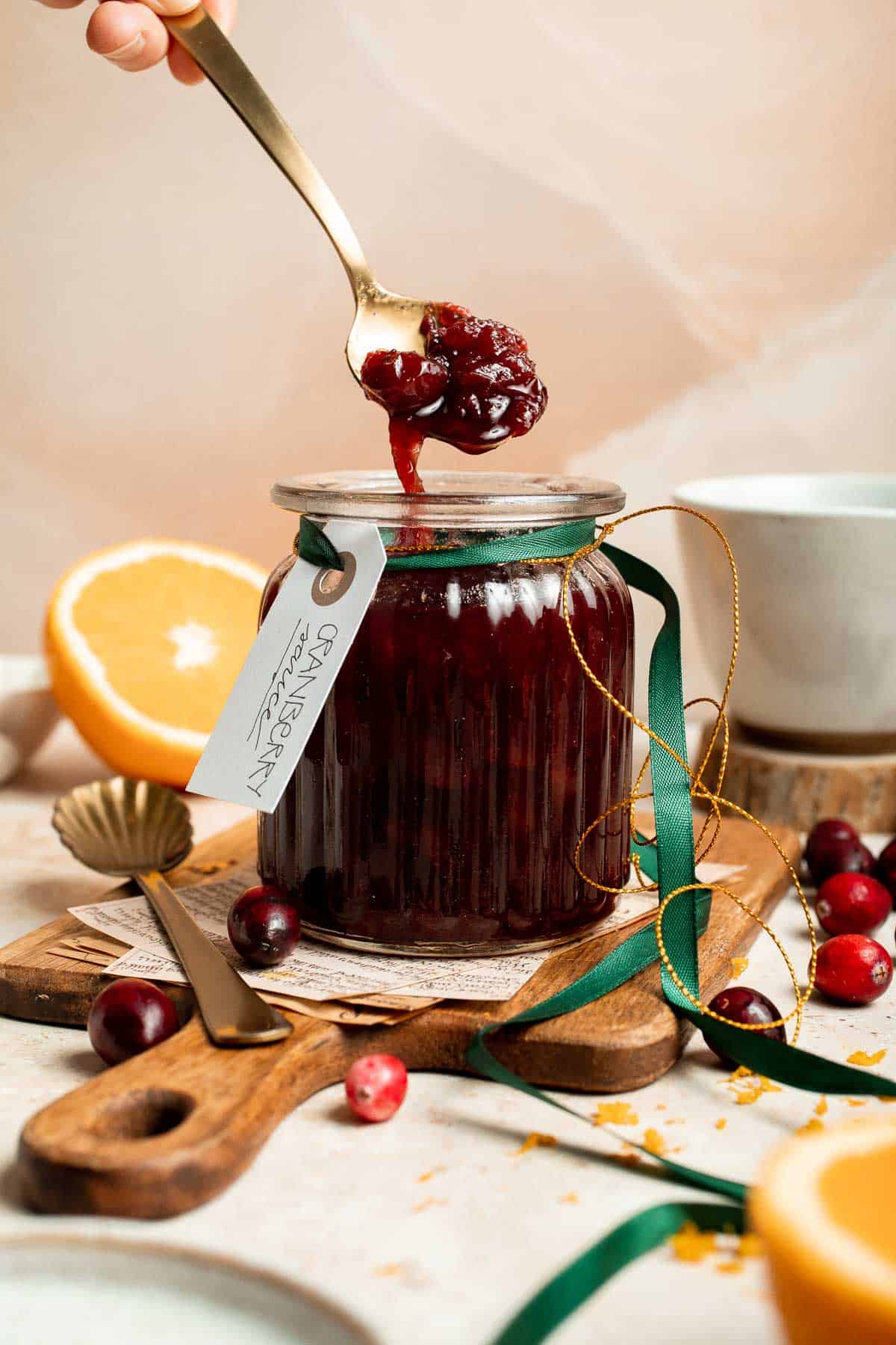 This slow cooker cranberry sauce is sweet, tart, and perfectly spiced. Make this easy cranberry sauce in the crockpot for a stress-free holiday side. | aheadofthyme.com