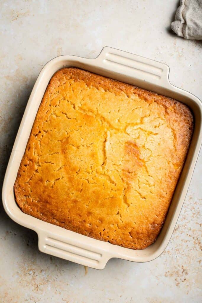 Soft, buttery, and comforting, this Southern Spoon Bread is part cornbread, part casserole. Perfectly fluffy and easy to make for any meal. | aheadofthyme.com