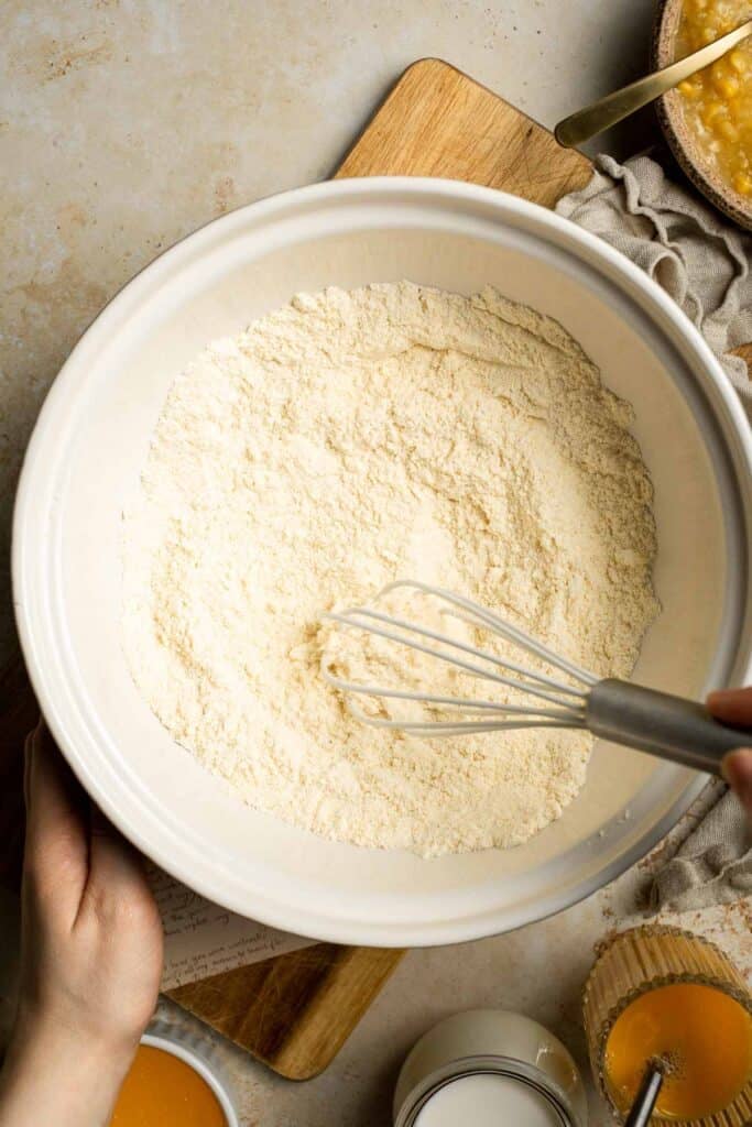 Soft, buttery, and comforting, this Southern Spoon Bread is part cornbread, part casserole. Perfectly fluffy and easy to make for any meal. | aheadofthyme.com