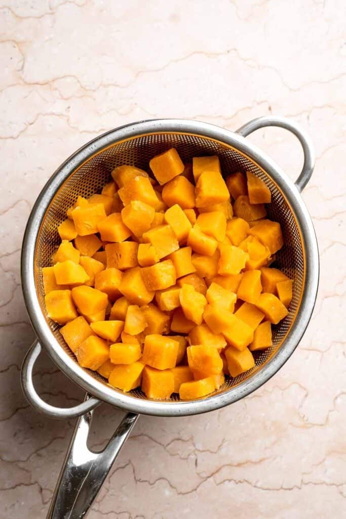 Sweet Potato Cake with Cream Cheese Frosting is soft, moist, and full of warm spice. It's a cozy fall dessert everyone will love. | aheadofthyme.com