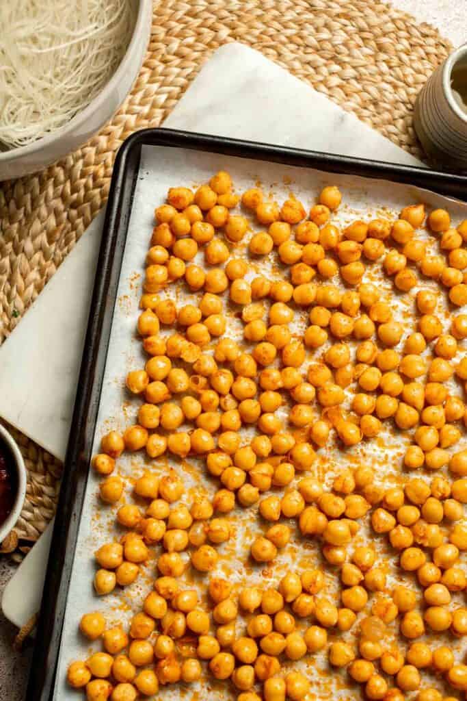 Creamy Thai Coconut Soup with Chickpeas is a cozy, protein-packed vegetarian noodle soup with a rich coconut curry broth and bold flavor. | aheadofthyme.com