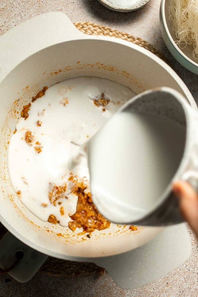 Creamy Thai Coconut Soup with Chickpeas is a cozy, protein-packed vegetarian noodle soup with a rich coconut curry broth and bold flavor. | aheadofthyme.com