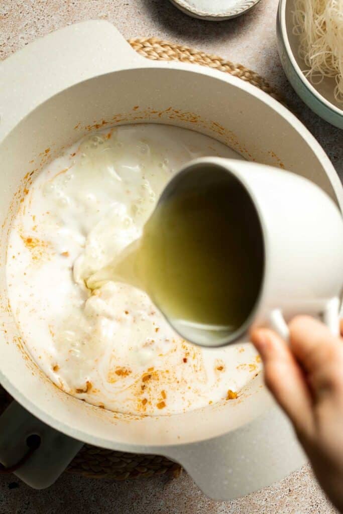 Creamy Thai Coconut Soup with Chickpeas is a cozy, protein-packed vegetarian noodle soup with a rich coconut curry broth and bold flavor. | aheadofthyme.com