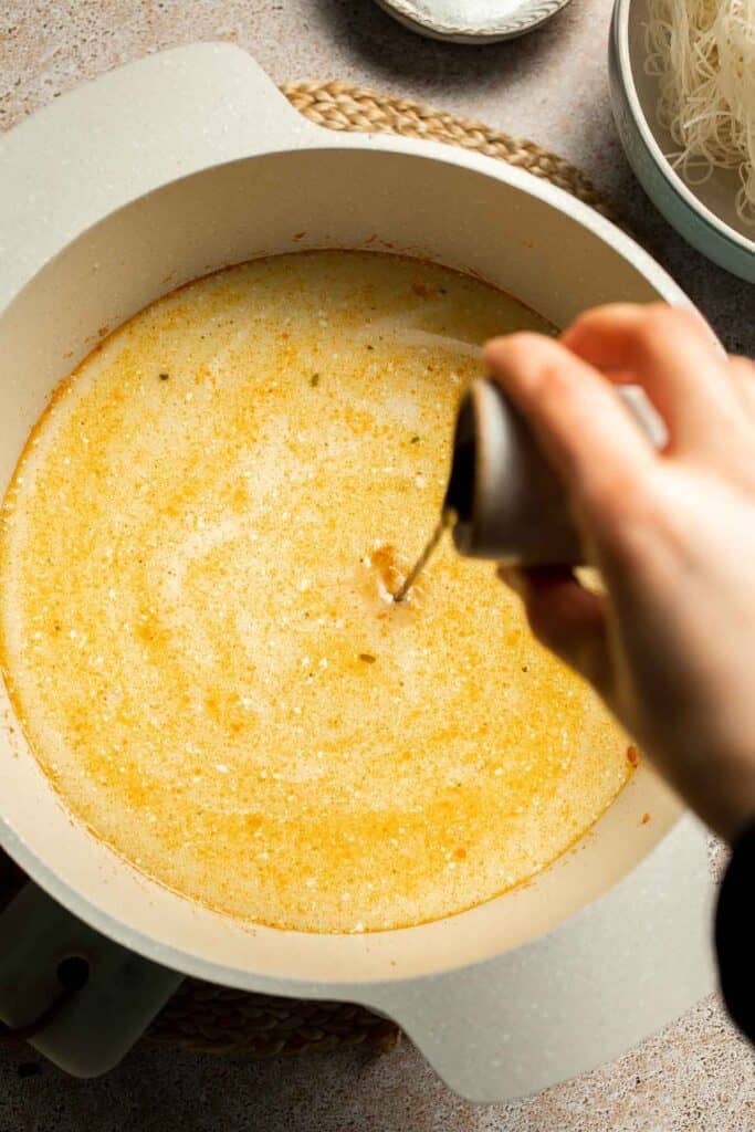 Creamy Thai Coconut Soup with Chickpeas is a cozy, protein-packed vegetarian noodle soup with a rich coconut curry broth and bold flavor. | aheadofthyme.com