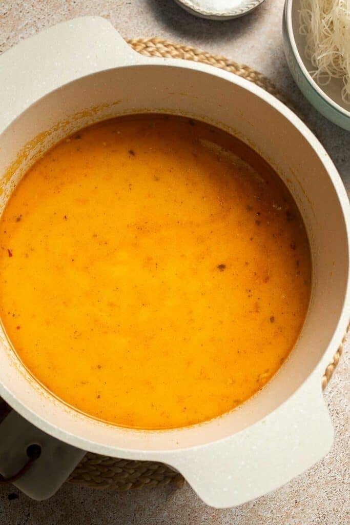 Creamy Thai Coconut Soup with Chickpeas is a cozy, protein-packed vegetarian noodle soup with a rich coconut curry broth and bold flavor. | aheadofthyme.com