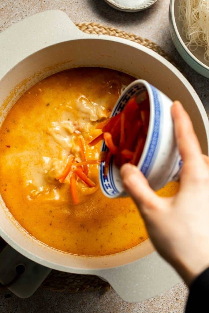 Creamy Thai Coconut Soup with Chickpeas is a cozy, protein-packed vegetarian noodle soup with a rich coconut curry broth and bold flavor. | aheadofthyme.com